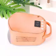 صورة جهاز تجفيف الأظافر الذهبي الوردي