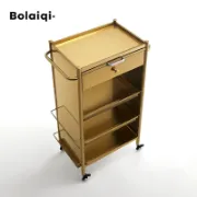 صورة عربة صالون فاخرة من الستانلس ستيل الذهبي بحاملات للأجهزة